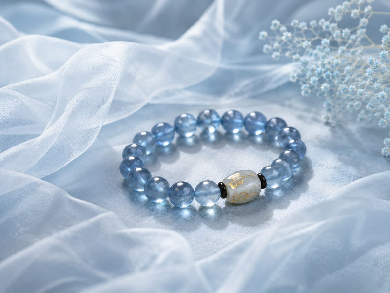 Natural Aquamarine Bracelet laid on a delicate fabric background, emphasizing its elegance for daily wear and thoughtful student lifestyle integration.