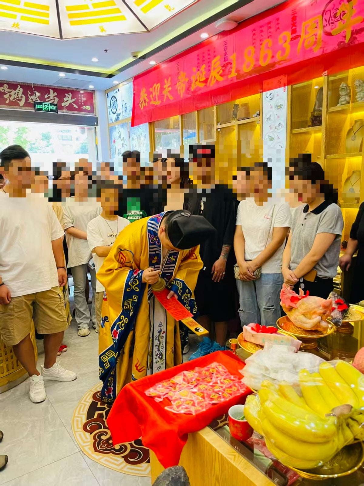 A practitioner performing a traditional Chinese oracle ritual in front of a group of people, illustrating classical divination methods for guidance.