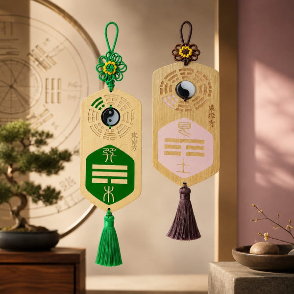 Two Missing Corner Plaques displayed together in an elegant indoor setting, featuring different color accents and tassels. The plaques highlight personalized Feng Shui support for different missing Bagua areas in the home.