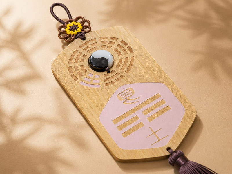 Close-up of a Missing Corner Plaque showcasing its smooth wooden surface, detailed Bagua carving, yin-yang centerpiece, and purple tassel. Highlights high-quality craftsmanship and durable materials.