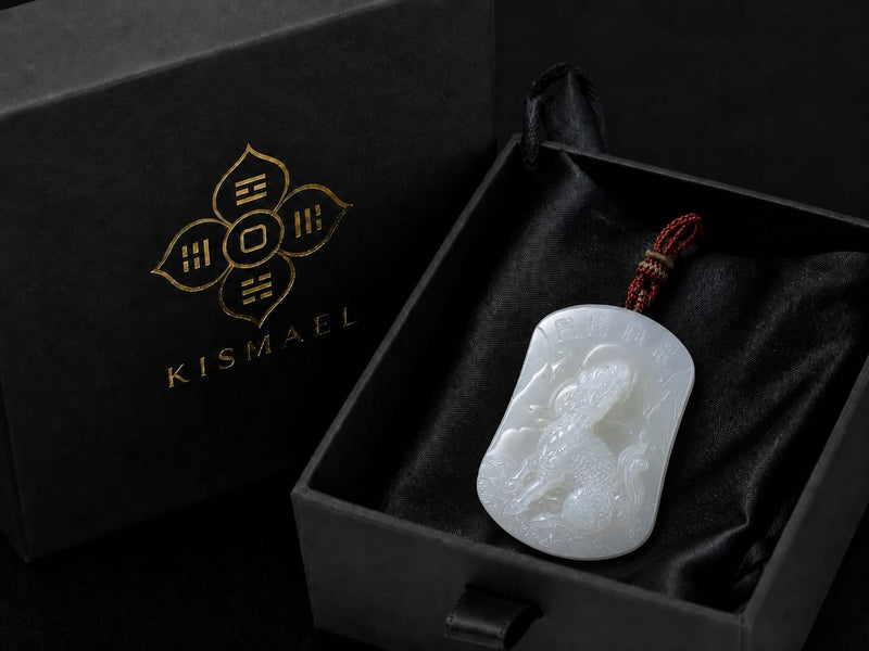 The Water Qilin jade pendant presented inside an open black gift box with a soft satin lining, highlighting its refined appearance and protective packaging.

图 4