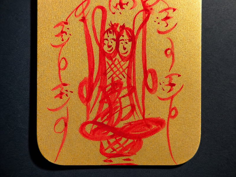 Detailed view of the central hand-drawn symbolic figure on the Wenchang Talisman. The red ink strokes represent clarity, intelligence, and alignment, with meticulous artistry conveying both aesthetic beauty and traditional meaning.